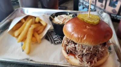 Crave offers delicious pulled chicken, pulled pork or smoked brisket. Get a sandwich, plate, slider or one of their many other fun meals! #beatthecraving