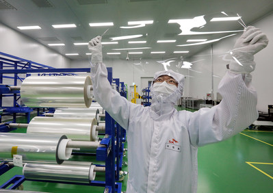 An employee of SK IE Technology is checking the FCW products soon to be supplied to a global smartphone manufacturer at FCW factory in Jeungpyeong, North Chungcheong Province, South Korea.