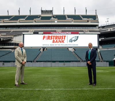 Richard J. Green, Chairman and CEO of Firstrust Bank (left) with Don Smolenski, Philadelphia Eagles President (right) at Lincoln Financial Field.