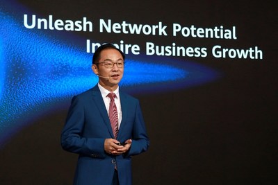 Ryan Ding delivers a keynote speech