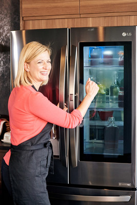 Anna Olson with LG InstaView Door-in-Door® Refrigerator (CNW Group/LG Electronics, Inc.)
