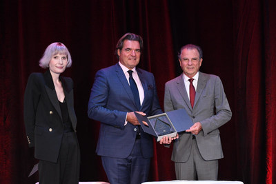 Sir Anthony presents a Family Office Lifetime Achievement Award. (left to right) Vanessa A. Eriksson, Global PR to Sir Anthony Ritossa and Chairman, Ritossa Family Office; Sir Anthony Ritossa, Ritossa Family Office; and Michael Dotta, Chairman, Monaco Economic Board (MEB), and Chairman, Dotta Family Office (PRNewsfoto/Ritossa Family Office)