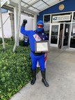South FL Doctor Dressed as Superhero Donates COVID-19 Safety Products to USPS Workers
