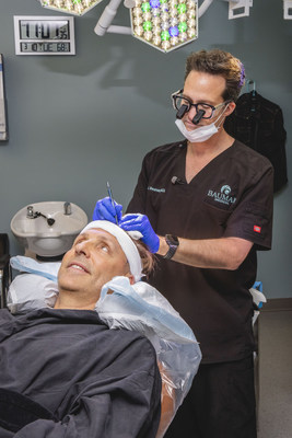 Board-Certified Hair Restoration Physician Alan J. Bauman, MD, ABHRS gives Bulletproof Founder and #1-rated podcast host Dave Asprey a new, more youthful hair line after recording his podcast on "Biohacking Baldness"