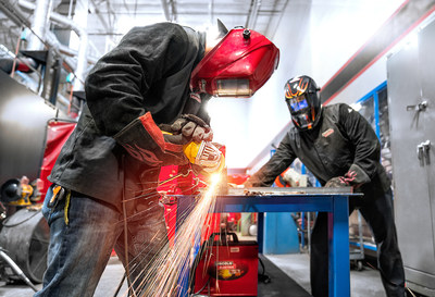 Two students in UTI's 36-week Welding Technology program train hands-on in real-life situations that prepare them for their careers.