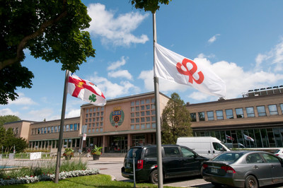 Flags at half-mast in front of Saint-Laurent Borough Hall in support of the Lebanese community faced with the present tragedy (CNW Group/Ville de Montral - Arrondissement de Saint-Laurent)