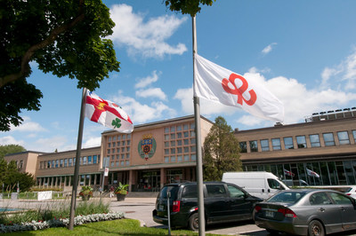 Flags at half-mast in front of Saint-Laurent Borough Hall in support of the Lebanese community faced with the present tragedy (CNW Group/Ville de Montréal - Arrondissement de Saint-Laurent)