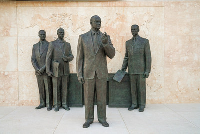 The Dwight D. Eisenhower Memorial features sculptures of Ike as President surrounded by advisors, and as General addressing troops on the eve of D-Day.