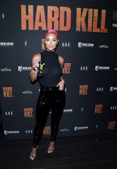 Fitness expert and WWE Total Divas star Natalie Eva Marie debuted the new REIGN Lilikoi Lychee flavor at Vertical Entertainment's World Premiere Drive-In of HARD KILL Powered by Reign Total Body Fuel at the Hollywood Palladium on Monday, August 24th. Photo Credit: Getty Images Tibrina Hobson