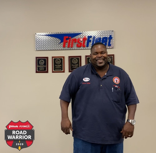 Eric Britton, a veteran and professional truck driver for First Fleet, is awarded the $10,000 grand prize in Pilot Flying J's annual Road Warrior program at a surprise presentation on August 21, 2020.