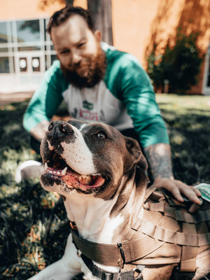 Marine veteran, David Fuller, with his service dog, Katie. David graduated from the Pets and Vets program at Tony La Russa's Animal Rescue Foundation (ARF) in 2017. ARF, along with Got Your Six Support Dogs, are partnering with Purina Dog Chow for its third annual 