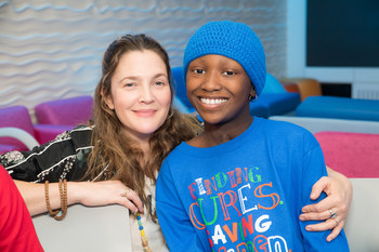 Actress Drew Barrymore (left) and St. Jude patient Damaya (right) hang out at St. Jude Children’s Research Hospital in 2017. The St. Jude Celebrity Ambassador is helping kick off the first week of the 30 Days #forStJude campaign.