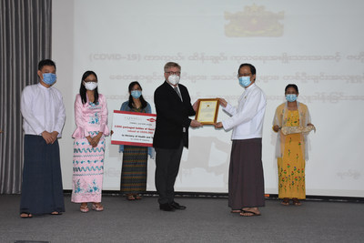 Connell reps at handover ceremony with the Government of Myanmar. Featured left to right: Khine Zaw Htoo, Dow; May Yamone, Market Unit Manager, Connell; Behind, Staff from Myanmar Ministry of Health & Sport; Lars Erik Larsen, Country Manager, Connell; Professor Dr. Thet Khaing Win, Myanmar Ministry of Health & Sport; Behind, Staff from Myanmar Ministry of Health & Sport