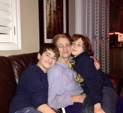 Former resident, Anna Sforza (deceased), pictured with her grandchildren. (CNW Group/Diamond and Diamond Lawyers)