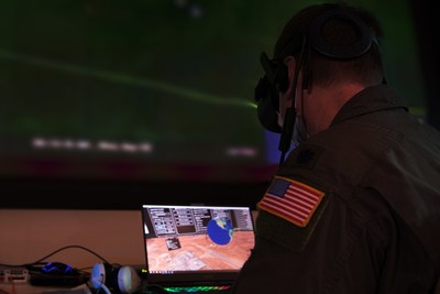 U.S. Air Force Airman operates Immersive Wisdom in 3D and Virtual Reality in support of the Advanced Battle Management System (ABMS) Onramp 2, Sept 2, 2020 at Joint Base Andrews, Maryland. (U.S. Air Force photo by Senior Airman Daniel Hernandez)