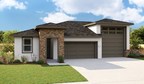 The Bronze plan with attached RV garage is one of three new model homes at Richmond American’s Seasons at Thoroughbred Acres community in Olivehurst, CA.