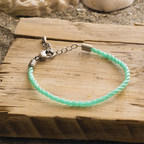 VitalChoice.com, a wild seafood delivery company, launches a limited edition bracelet to support coastal clean-up efforts