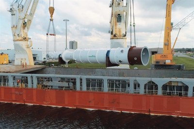 A completed LNG heat exchanger manufactured at Air Products' Port Manatee facility is being loaded on a carrier at the Port of Manatee for shipment to the customer.