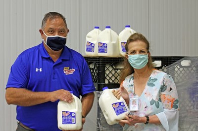Cathy Pope, president & CEO of Mid-South Food Bank and David King, Memphis area sales manager for Prairie Farms.