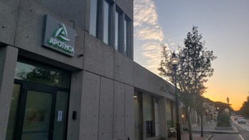 Apothca's Arlington adult-use dispensary at sunset