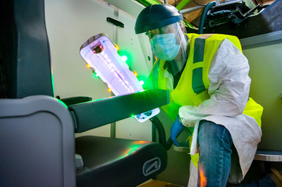 The UV wand can disinfect high touch surfaces. (Photo by Marian Lockhart/Boeing)