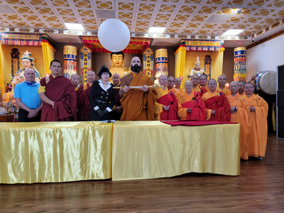 Chairperson Suzi Leggett handed the Pope of Buddhism Scepter to Venerable Mozhi Rinpoche, representative of World Buddhism Association Headquarters, for the Scepter to be returned to His Holiness Dorje Chang Buddha III.