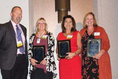 Carl McMillan, DMD, Chair of IAOMT's Education Committee, awards Annette Wise, RDH, Barbara Tritz, RDH, and Debbie Irwin, RDH, with their Biological Dental Hygiene Accreditation.