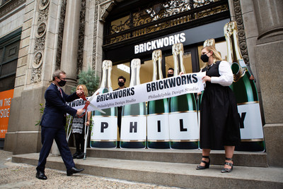 Mark Ellenor, President of Brickworks North America, cuts the ribbon at the official grand opening of the Brickworks Design Studio in Philadelphia.