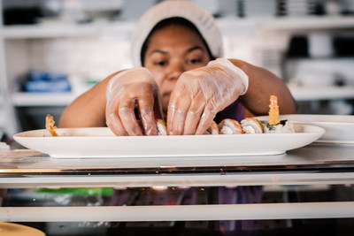 Restaurant management apprentice Kadeeja Baker prepares a sushi roll at Maru Sushi in Kalamazoo, Michigan. Baker said she was “honored” to be part of the apprenticeship program—and was promoted from Sushi Chef to Head Sushi Chef in less than a year.