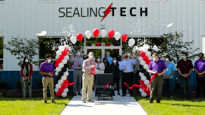 Chief Executive Officer of Sealing Technologies Inc, Ed Sealing (center), Chief Operating Officer, Brandon Whalen (right), and Chief Financial Officer, Daniel Zick (left), officiate the Ribbon Cutting Ceremony at the SealingTech Integration Facility in Stevensville, MD.