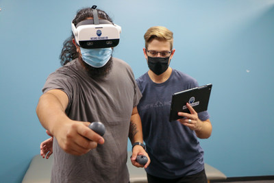 Physical therapist and patient utilize XR Therapy System by Neuro Rehab VR