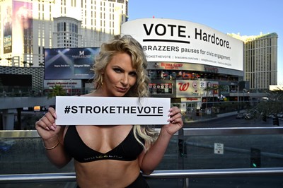 Brazzers exclusive adult entertainment star Phoenix Marie poses in front of voting PSA billboard at Harmon Square in Las Vegas, encouraging Americans to vote.
