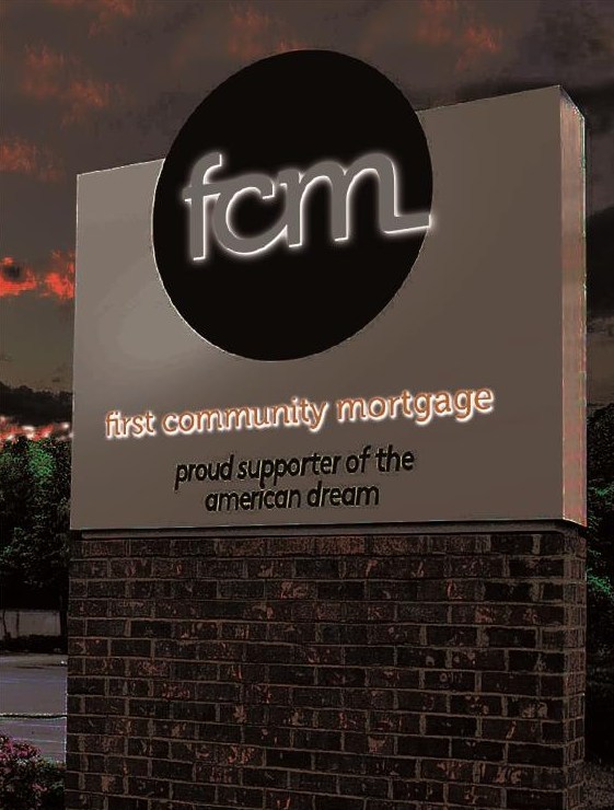 First Community Mortgage's new branding, displayed on signage.