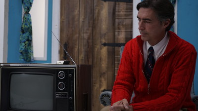 The ads attacking Donald Trump feature a Mr. Rogers lookalike