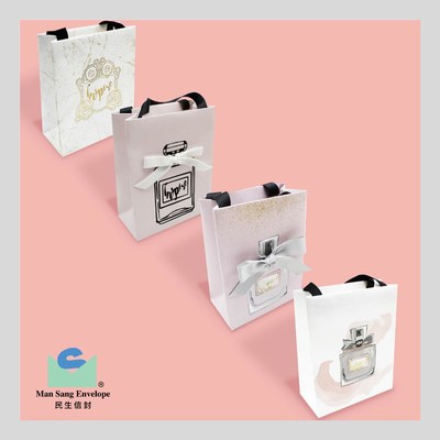 Paper carrier with twinkle finish and ribbon attachment