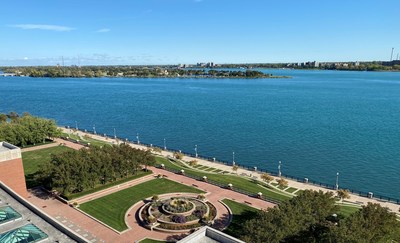 View of Detroit River Walk and Belle Isle from outdoor terrace.