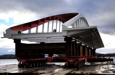 The first of four new bridges for the Port Lands loaded onto a barge in Dartmouth, waiting to set sail for Toronto. (CNW Group/Waterfront Toronto)