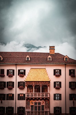 The Golden Roof covered in Clouds, Innsbruck, Tirol, Austria. Photo by Daniel Diesenreither on Unsplash