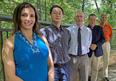 Auburn University School of Forestry and Wildlife Sciences faculty members Sole Peresin, Yucheng Peng, Graeme Lockaby, Brian Via and Tom Gallagher are exploring ways to give new life to timber decimated by hurricanes.