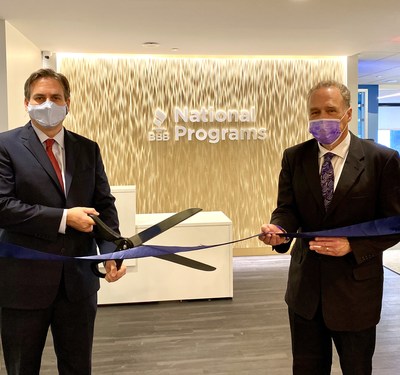 Eric D. Reicin, President and CEO, BBB National Programs is joined by David Kelley, Director, National Business Investment, Fairfax County Economic Development Authority at the ceremonial ribbon cutting of the new office space.