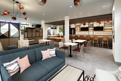 Atwell Suites’ main lobby space adjacent to the check-in counter is designed to bring people together around the breakfast area, lounge and bar.