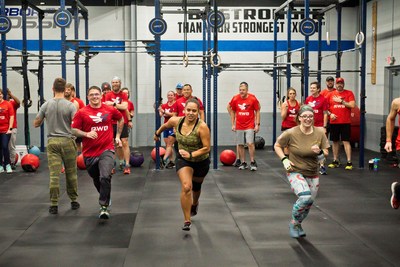 Team Red, White & Blue members participate in WOD for Warriors in 2019.