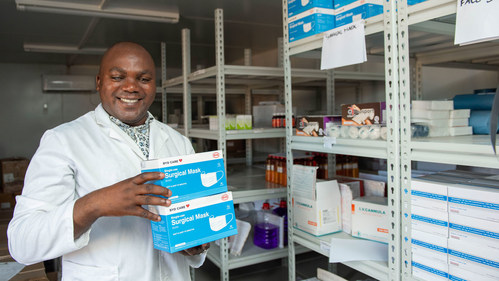Abraham Paul, PA, at the Nkhunga Health Centre in Malawi with donated PPE from CAF Africa. (Photo by Homeline Media)