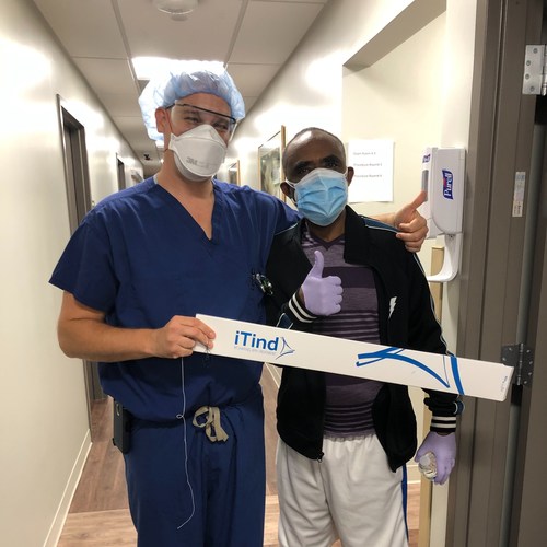 Dr. Jonathan Warner (left) with Dr. Seyoum Gebremariam, one of the first patients treated for Benign Prostatic Hyperplasia (BPH), also known as enlarged prostate, using the minimally invasive iTind device.