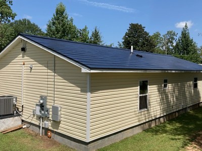 A Tesla Solar Roof was installed on this Habitat for Humanity Home in Hattiesburg by Cross Roofing, a Certified Tesla Installer, in less than three days.