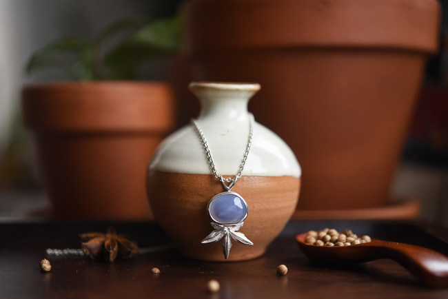 Nafiza Necklace, Chalcedony gemstone and sterling silver pendant modeled after a star anise ($112), Cardamom Collection (Photo credit: Sarah Annay Photography)