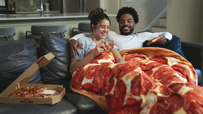 Just in time for the holidays, Pizza Hut has partnered with Gravity Blanket to release the limited-edition Original Pan® Weighted Blanket, and it’s just as warm and toasty as the legendary Original Pan Pizza itself.