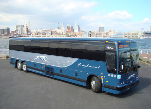 A new Greyhound bus, which features leather seats, extra legroom, Wi-Fi, power outlets, three-point seat belts, on-board restroom and wheelchair lift. (PRNewsFoto/Greyhound Lines, Inc.)