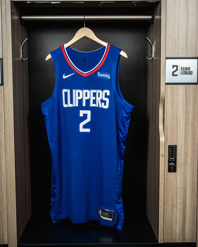 An LA Clippers jersey displaying the new Honey patch is shown hanging in Kawhi Leonard’s locker at the Honey Training Center: Home of the LA Clippers as the two Los Angeles-based companies expand their partnership.