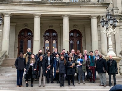 Spring Arbor University and Oberlin College Students from the pilot course for Bridging the Gap pose for a photo outside of the Michigan State Capitol Building.